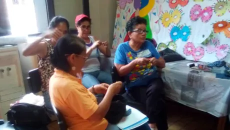 Participants in a sewing workshop for mothers and other community members at the IELV-run 