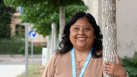 Rev. Adita Torres Lescano, Pastor President of the Lutheran Church of Peru, visiting the tree planted by representatives of her church in the Luthergarten in Wittenberg. This Reformation 2017 project symbolizes the ecumenical relationships of Christian churches worldwide through 500 trees creating a living memorial. Photo: LWF/A. WeyermÃ¼ller