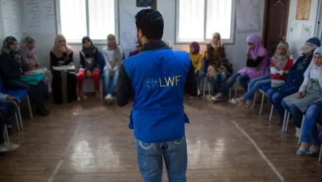 Syrian refugee Ahmad instills the value of education at the Za'atari camp. Photo: LWF Jordan