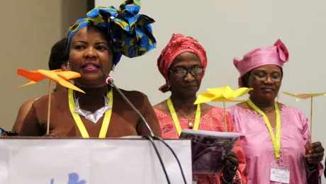 Presenting the Womenâs Message at the Africa Pre-Assembly symbolized by the four wings of a windmill are (from left) Faustina Manyangu (Evangelical Lutheran Church in Tanzania), Council member Titi Malik (The Lutheran Church of Christ in Nigeria), and Rev. Dr Jeannette Ada Maina (Evangelical Lutheran Church of Cameroon). Photo: LWF/A. WeyermÃ¼ller