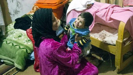 This Christmas, LWF President Bishop Younan draws attention to the plight of millions of refugees across the world, who like baby Amera and her mother in northern Iraq, are seeking refuge from persecution. Photo: LWF/Seivan Salim