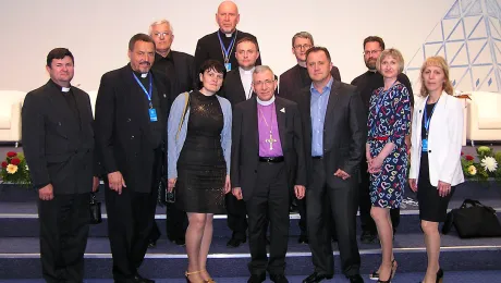 LWF President Bishop Dr Munib A. Younan with Bishop Yuri Novgorodov (very last row) and other pastors and church officials of the Evangelical Lutheran Church in the Republic of Kazakhstan, during the June visit to Astana. Photo: ELCRK