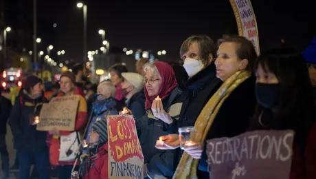 People of different faith traditions gather for a silent vigil in Glasgow, during the COP26 summit, to remember all those suffering from the impact of climate change. Photo: LWF/A. Hillert