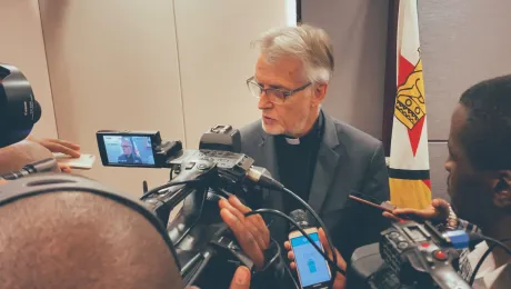 Journalists interview LWF General Secretary Martin Junge following a meeting with government officials in Harare. Photo: LWF/A. Danielsson