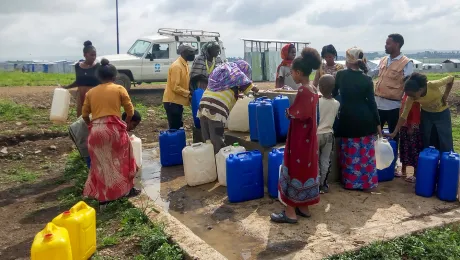 IDPs in Mekelle collecting water in Seba Kare IDP camp. LWF has constructed a water system in the camp, which was previously supplied with water by water trucking. Photo: LWF/ T. Debessu