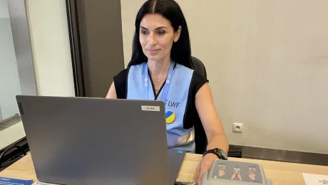  Olga, from Odessa, working in the LWF multipurpose cash assistance center in Gdánsk. Photo: LWF/ B. Pachuta 