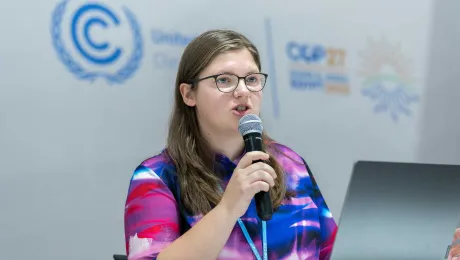 Michelle Schwarz from the Evangelical Lutheran Church in Saxony (Germany) is an LWF delegate to COP27. Here she speaks on an interfaith youth panel during a side event of the UN climate conference. LWF/Albin Hillert