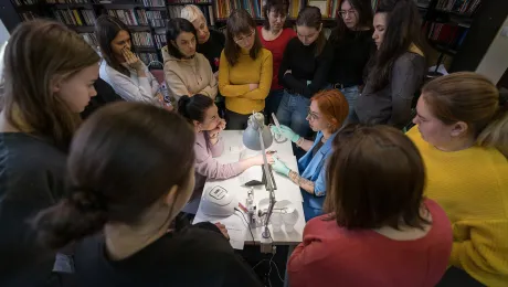 Participants witness a demonstration at the manicure workshop. Photo: LWF/ Albin Hillert