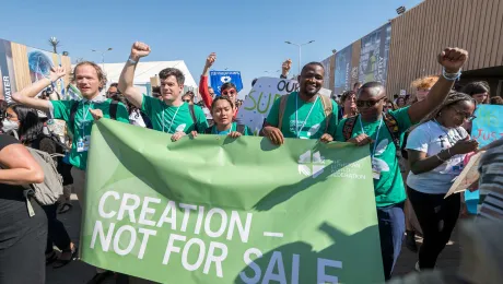 Young delegates from the Lutheran World Federation join hundred people from civil society organizations and faith communities across the globe to march at the United Nations climate change conference COP27 in Sharm el-Sheikh, Egypt. Photo: LWF/Albin Hillert 