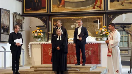 Blessing Rev. Inken Wöhlbrand (center) for her continued journey: (from left) Rev. Dr Dennis Pistol (Evangelical Lutheran Church in Northern Germany), Bishop Kristina Kühnbaum-Schmidt (GNC/LWF), Rev. Dr Ireneusz Lukas (LWF Regional Secretary for Europe) and Rev. Dr Sámuel Nánási (Director of Studies LWF Center Wittenberg). Photo: GNC/Cornelia Kirsch