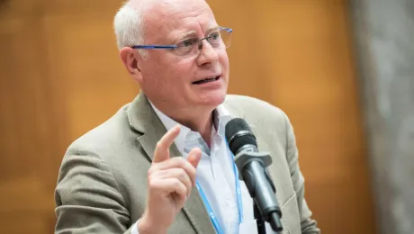 Oberkirchenrat Norbert Denecke in conversation during the LWF Council meeting in 2018 which was held in Geneva. Photo: LWF/Albin Hillert