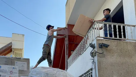 Personnel at the Ahli Arab Hospital off-loading the LWF medical supplies from a delivery truck. Photo: LWF Jordan