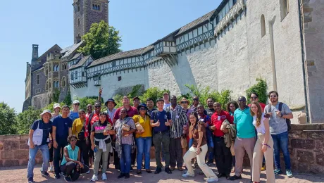 Participants of the 2024 summer school by Mission EineWelt during a visit to Wartburg Castle where the Reformer Martin Luther translated the New Testament into German. Photo: LAC