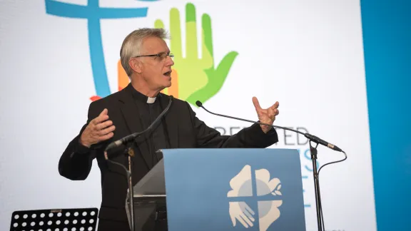 The Lutheran World Federation (LWF) General Secretary Rev. Dr Martin Junge, addressing the 800 participants from LWFâs 145 member churches at the Twelfth Assembly. Photo: LWF/Albin Hillert