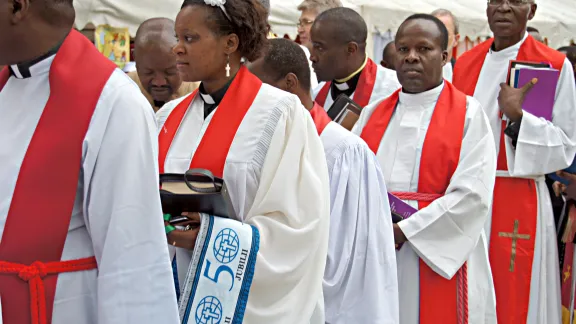 Pastors from the ELCT prepare for the procession preceding the worship service to mark the 50th anniversary of the church. Â© LWF/H. Martinussen