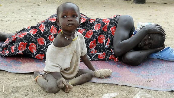 A child wounded in the fighting rests at Juba hospital, where the LWF is providing blankets, food and water. Â© LWF