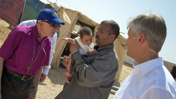 The LWF President and General Secretary visit Zaâatri residents in 2012. Photo: LWF/Thomas Ekelund