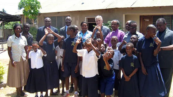 The Lutheran leaders with children residing at the ELCT center in Temeke district, Tanzania. Â© ELCT