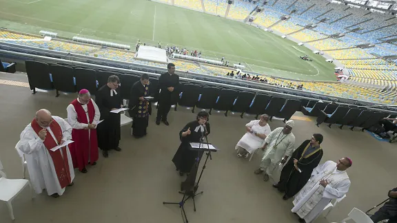 Rev. Lusamarina Campos leads an interreligious service in May in the Maracana arena in the lead-up to the 2014 FIFA World Cup in Brazil. Photo: Vitor Jorge