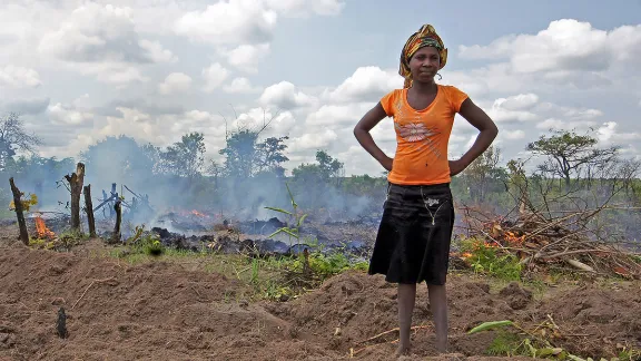 A woman clears a plot of land in Moxico, Angola. Although the land belongs to the community, village chiefs can lease it to outside investors. All photos: LWF/ C. KÃ¤stner