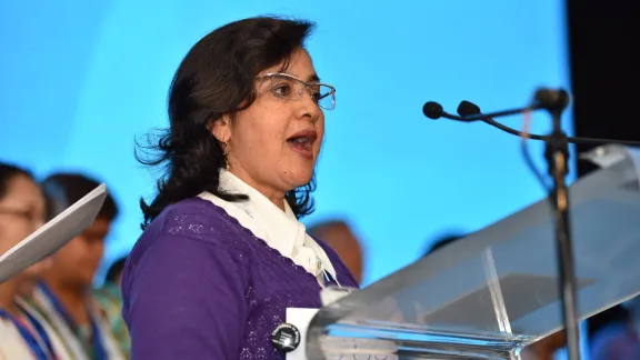 Delegate of the Women's Pre-assembly delivers the message to Twelfth LWF Assembly delegates. Photo: LWF/ Albin Hillert