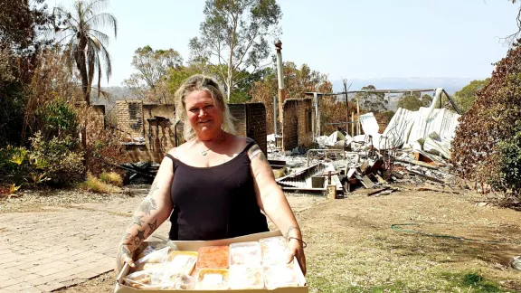 Sue Cutting, a foster mum of seven who lost her house in the fires, was delighted to receive food relief from Adelaide Hills Lutheran and community volunteers. Photos: LCA