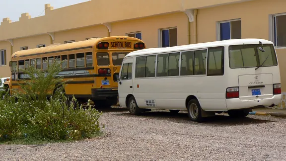 The yellow school bus in Markazi refugee camp that transports children from the refugee camp to school each day. Photo: ALWS/ Jonathan Krause