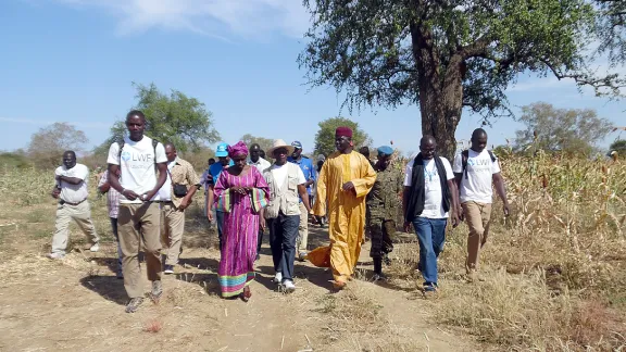 Staff, beneficiaries and visitors visiting project fields in Kimiti department. Photo: LWF Chad