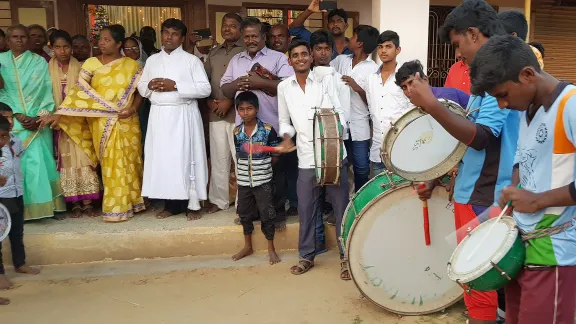 Members of Christ Lutheran Church worship to the sound of drums outside a church. Photo: LWF/Philip Lok