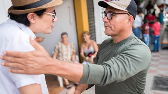 The Evangelical Lutheran Church of Colombia accompanies ex-combatants and the communities into which they are reintegrating. Here, former FARC commander "Harrison" greets Lutheran pastor Rev. John Hernández. Photo: LWF/Albin Hillert