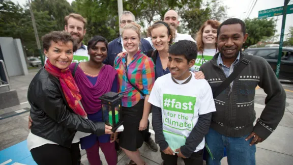 UN Climate Change General Secretariat, Christiana Figueres poses with LWFâs Fast for the Climate Youth Delegation. Photo: LWF/Sean Hawkey