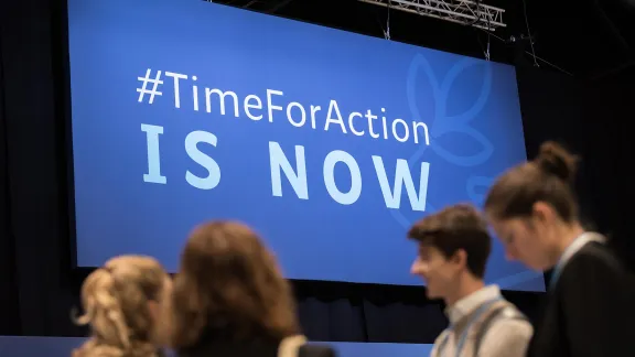 Young people attending COP25 in Madrid, Spain, in 2019. The slogan â#TimeForAction is nowâ has not lost its urgency. Photo: LWF/Albin Hillert