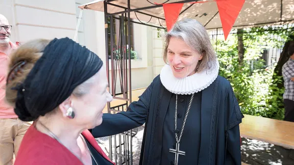 PrÃ¶pstin Astrid Kleist greets participants after the service. Photo: LWF/ Albin Hillert