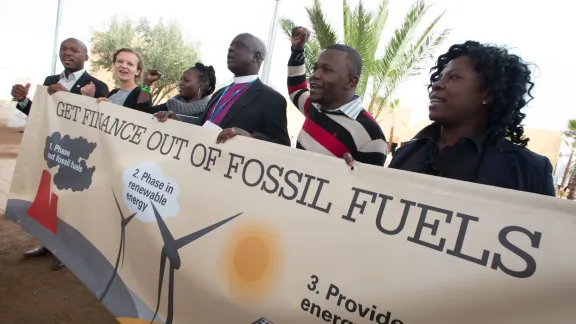 Campaign stunt symbolizing divestment from fossil fuels and support of renewable energies at COP 22 in Marrakech, Morocco in December 2016.  Photo by LWF/Ryan Roderick Beiler