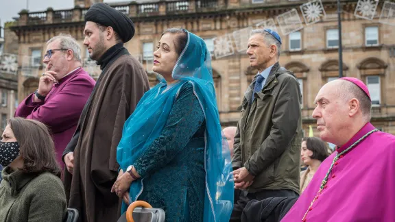 Interfaith vigil held at George Square on the opening day of the UN Climate Change Conference COP26 in Glasgow. The vigil gathered representatives from a wide range of religions as well as people of no faith. Photo: LWF/Albin Hillert