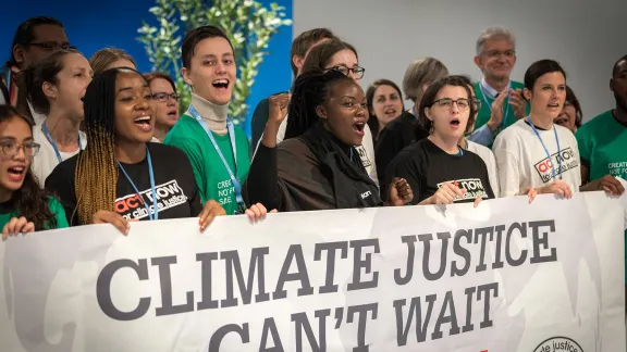 Faith-based actors including the LWF joined the calls for climate justice at the COP 25 conference in Madrid, Spain. Photo: LWF/Albin HillertÂ 