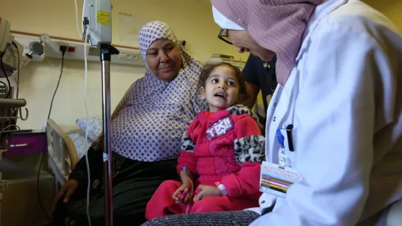 A child receiving dialysis at Augusta Victoria Hospital, East Jerusalem. The presence of a parent for treatment is one of the key demands of the LWF. Photo: Atta Jabr 