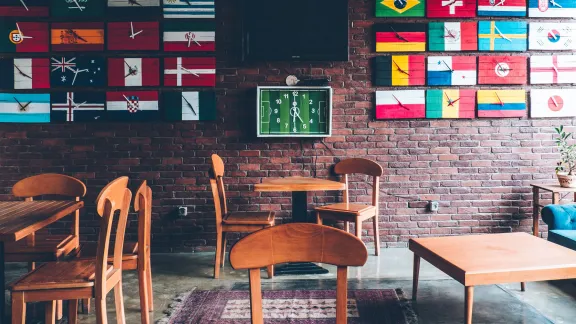 National flags on display at an urban cafÃ© in Tehran, Iran. Photo: Unsplash/Farzad Mohsenvand 