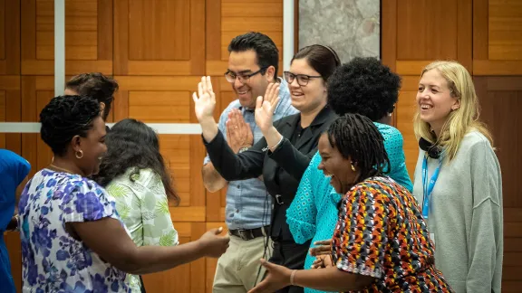 The LWF co-organizes an annual training for faith-based organizations on advocacy for womenâs human rights, in Geneva. A group of participants in the 2019 event take part in a role-play session on collecting information at community level. Photo: LWF/ S. Gallay 