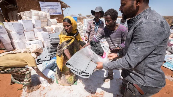 LWF staff distribute IMO-sponsored non-food items at the Wada IDP site in Seweyna woreda, Oromia province. The Lutheran World Federation supports internally displaced people in several regions of Ethiopia. Photo: LWF/ Albin Hillert