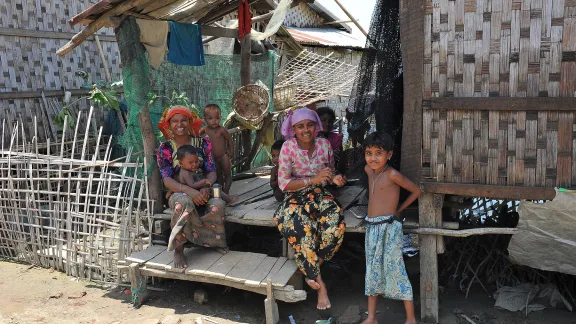 A Rohingya family in an IDP camp in Pauktaw, near Sittwe. LWF, among others, runs informal learning spaces and trains teachers to provide education for the displaced children. Photo: LWF/ C. KÃ¤stner