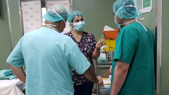 Dina Nasser, (2nd from left) health advisor at LWF AVH, works with doctors during a recent trip to Gaza. Photo: LWF/ Shaban Mortaja