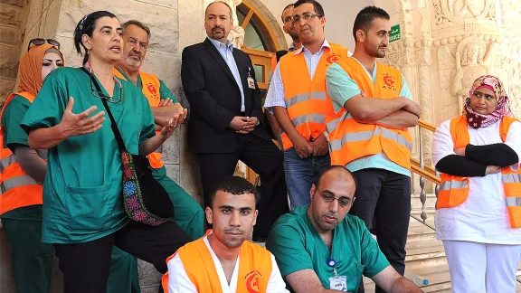 Dina Khoury, OR and infection Control Nurse, and others who were part of the AVH team sent to Gaza in August 2014, shared their experiences with an assembly of AVH staff upon the team's return to Jerusalem. Photo: LWF Jerusalem