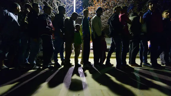 Refugees queue at Chios, Greece. Photo: Paul Jeffrey