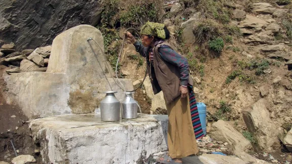 Thanks to collaboration between the LWF and IRW, locals have a fountain that provides safe drinking water. Photo: LWF/IRW