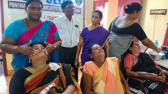 In Chennai, India, the Christ Lutheran Church runs economic empowerment and personal development skills for members of the transgender community. In this photo, Bishop Dr M. Stanley Jose (background, second from left), with some of the students in a beautician course. Photo: CLCÂ 