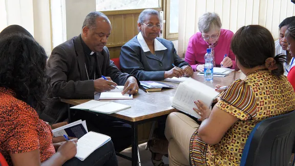 Rev. Dr Wakseyoum Idosa Negeri, president of EECMY, in discussion at the Gender Justice Policy workshop in Ethiopia, Feb. 2014. Photo: LWF/Elaine Neuenfeldt