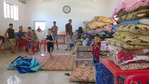 Durch die Kämpfe im Nordirak Vertriebene haben in den Kirchen der Stadt Babilo, Dohuk, Zuflucht gefunden. Der LWB arbeitet in der Flüchtlingshilfe mit Christian Aid zusammen. Foto: ACT/Anne Alling