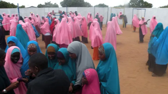 Girls assemble in a school yard in Dadaab refugee camp, Kenya. Education is a focus of LWF work in the camp. Photo: LWF/Kenya