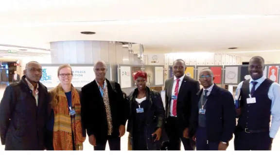 (L-R) The Advocacy Officer of the UPR Project of LWF, Mr. Peter Eceru, at the extreme right together the Ugandan team. Geneva, March 2017. Photo: LWF Uganda / Stephen Okello & Clement Aluma